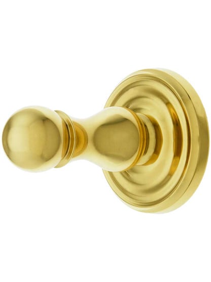 Solid Brass Single Hook Post with Classic Rosette in Polished Bras.